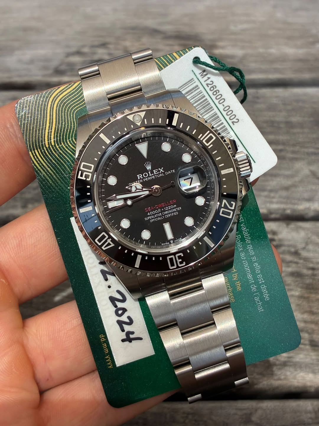May be an image of wrist watch and text