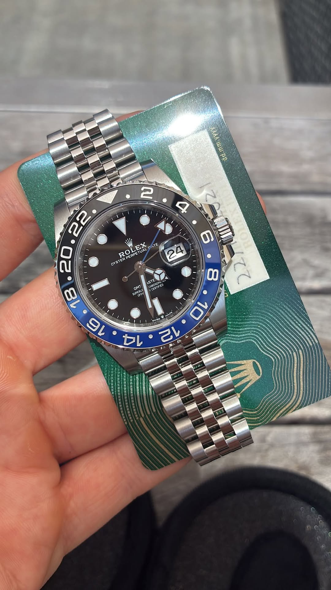 May be an image of wrist watch and text