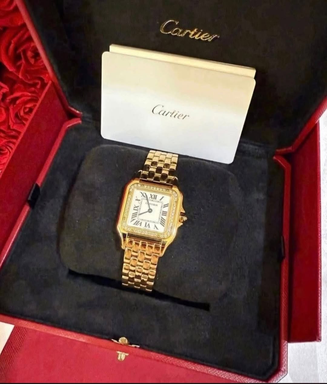 May be an image of wrist watch and text that says 'Cartier Cartier PRRENN XII YNGM LX'