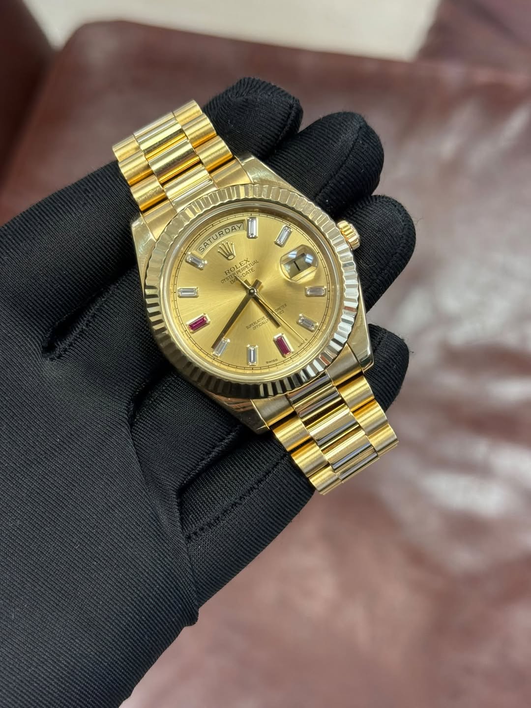 May be an image of wrist watch and text