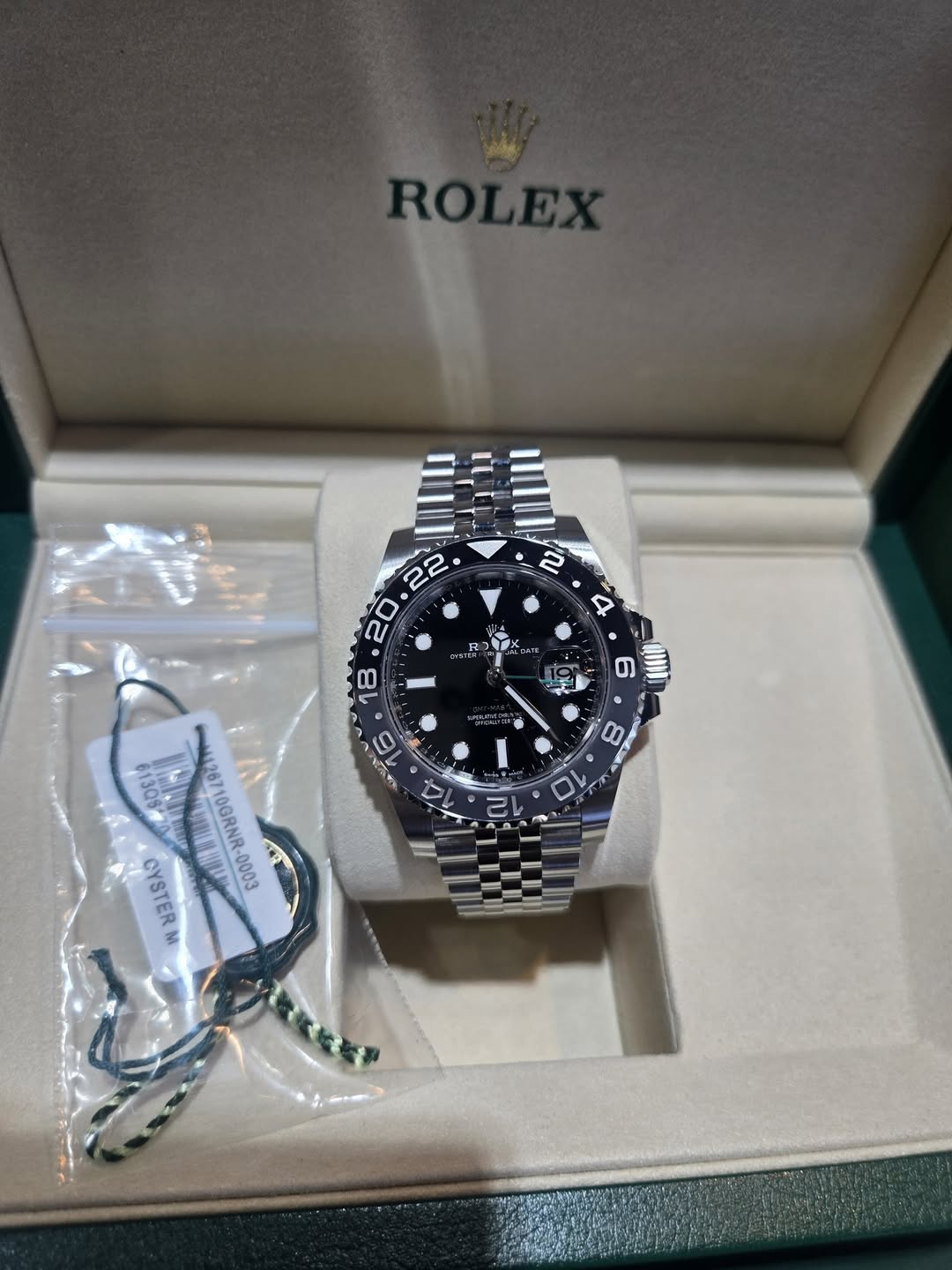May be an image of wrist watch and text