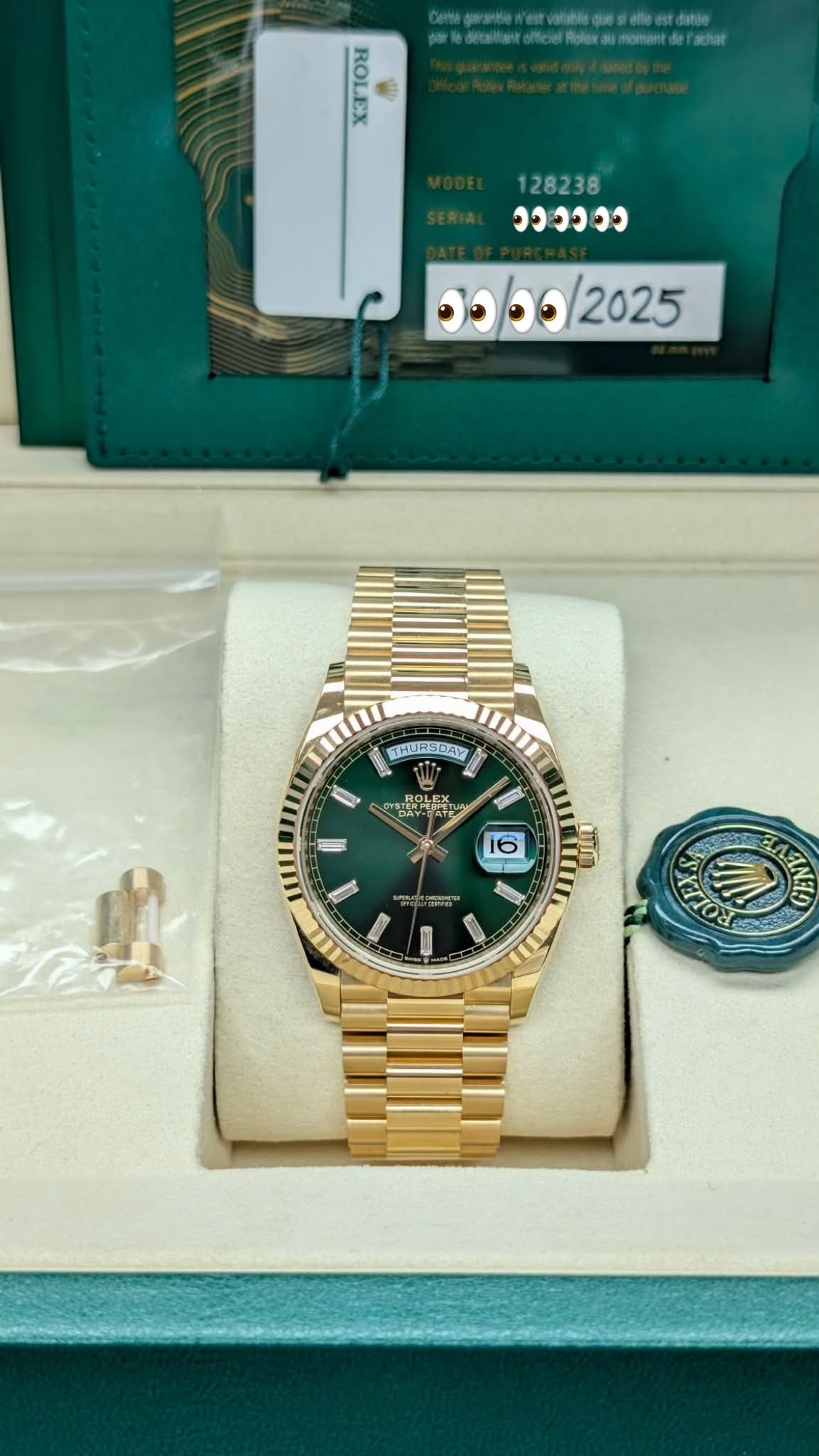 May be an image of wrist watch and text