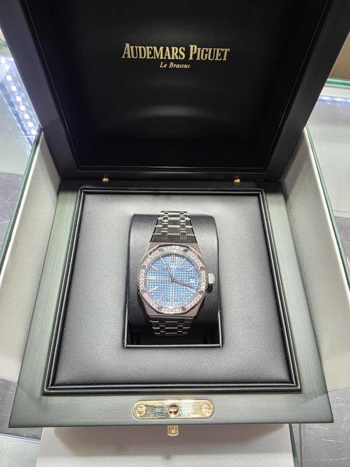 May be an image of wrist watch, timer and text