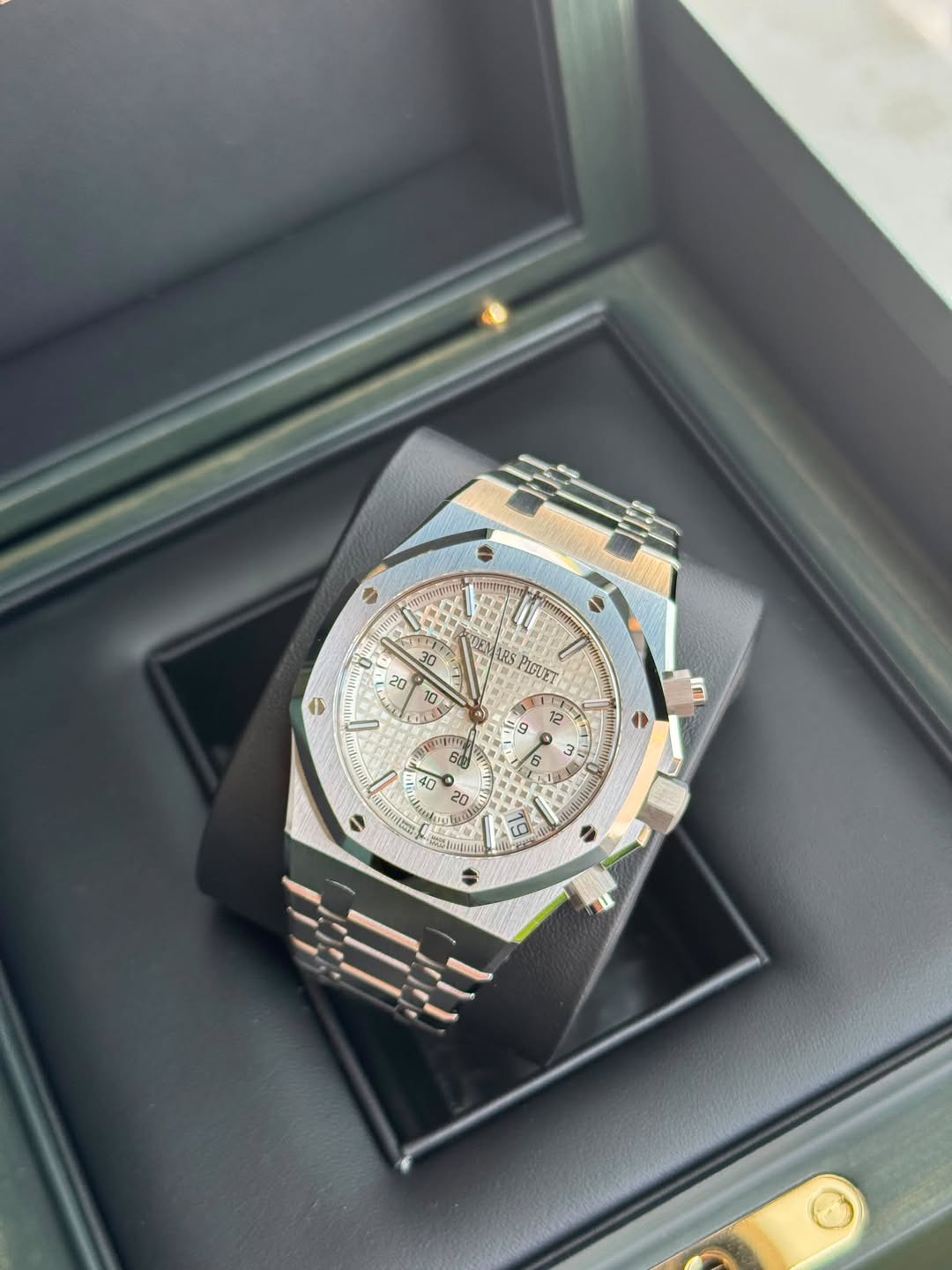 May be an image of wrist watch and text