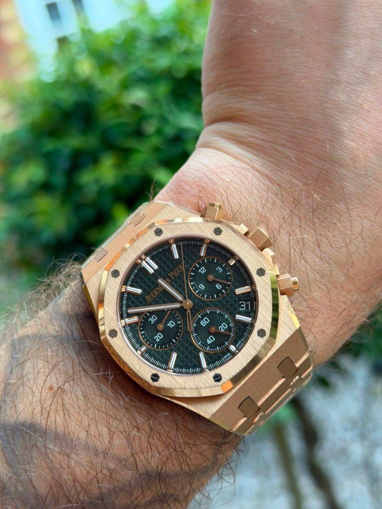 May be an image of wrist watch and text