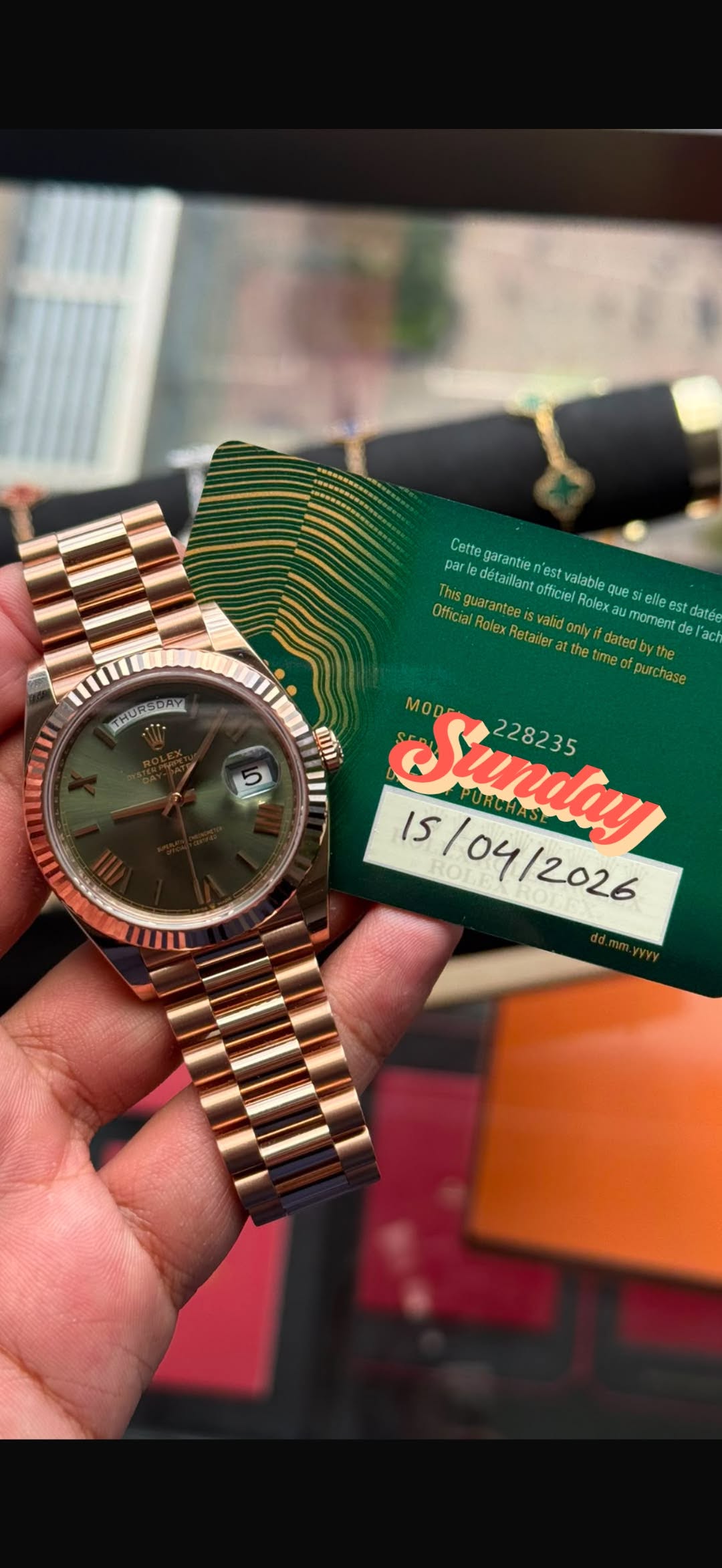 May be an image of wrist watch and text