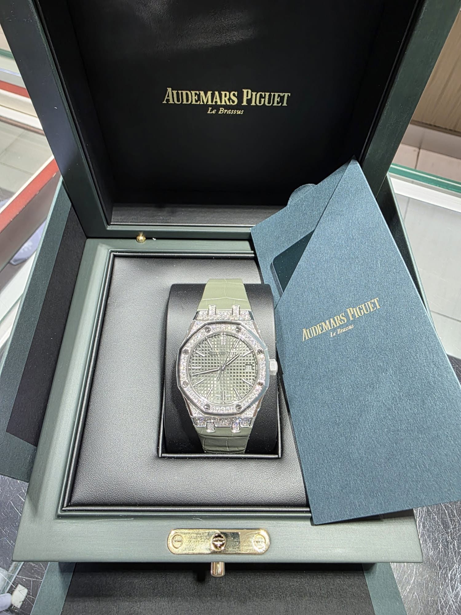 May be an image of wrist watch and text
