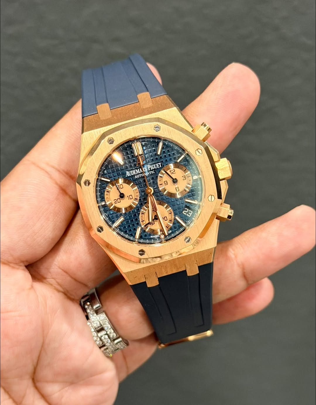 May be an image of wrist watch and text