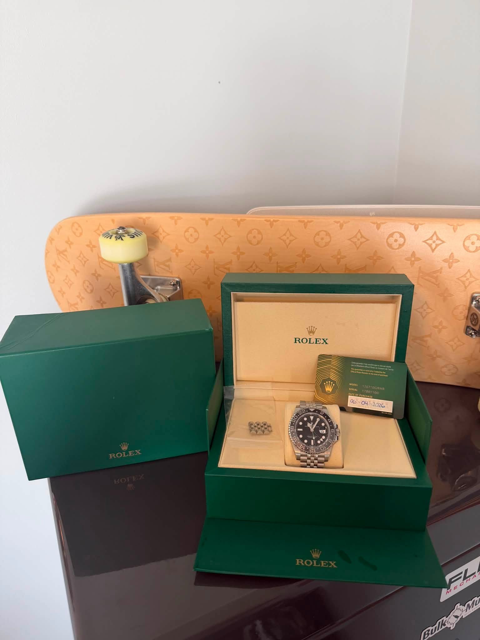 May be an image of wrist watch and text