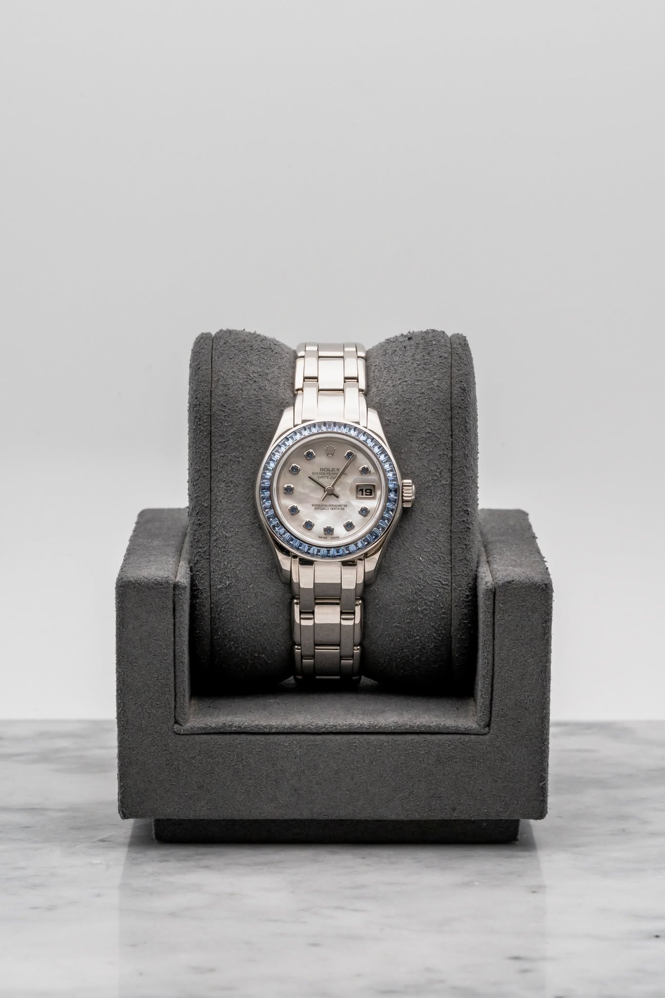 May be an image of wrist watch and text