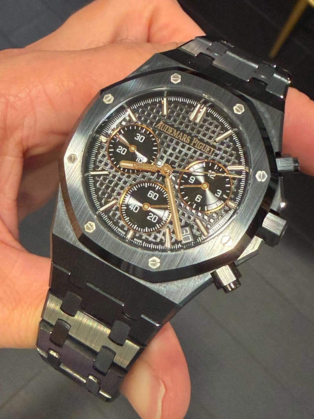 May be an image of wrist watch and text