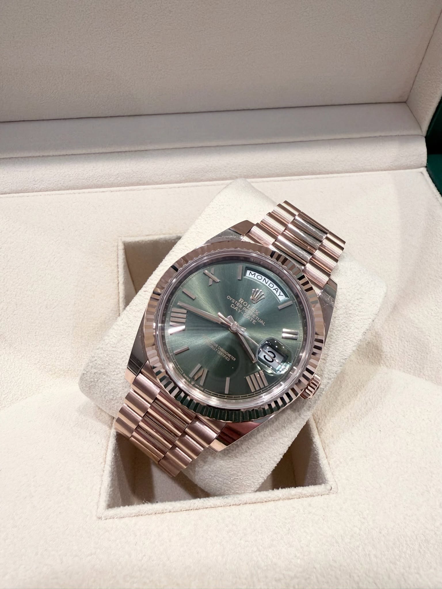 May be an image of wrist watch and text