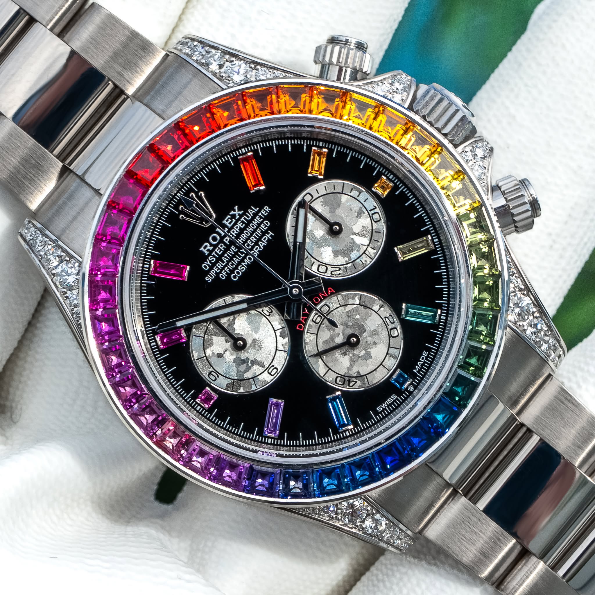 May be an image of wrist watch and text that says '社 أتم 7 n 1 EX SHRONOMETER RPETUAL ER όχεo SUPERLATIVE OFFICIALLY MESTER STERPERPE STERPER COSMO AHRONOME!! SMOKRAPH CERTIFIED…