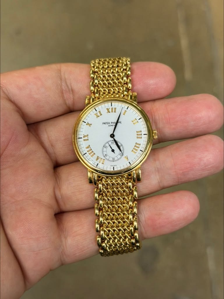 May be an image of wrist watch and text that says 'ΧΙΙ PATEK PHIN TEKPHI HID GENEV ENE X ล IX 60 w 50 T K LA III III 에전니'