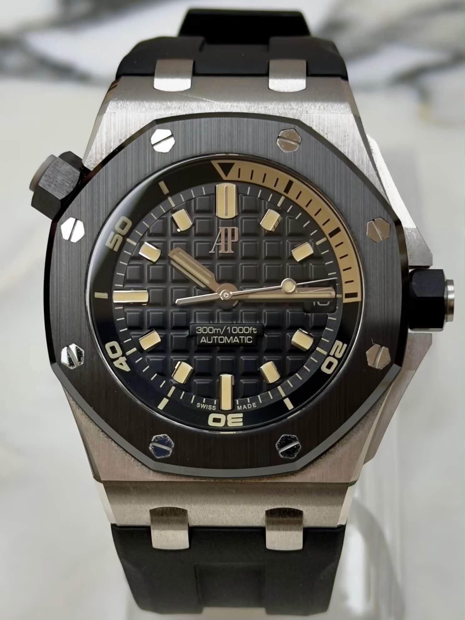 May be an image of wrist watch and text that says 'AP 300m/1000ft 100 0O0 OODft 300m AUTOMATIC 44 20 N WISS MADE OE'