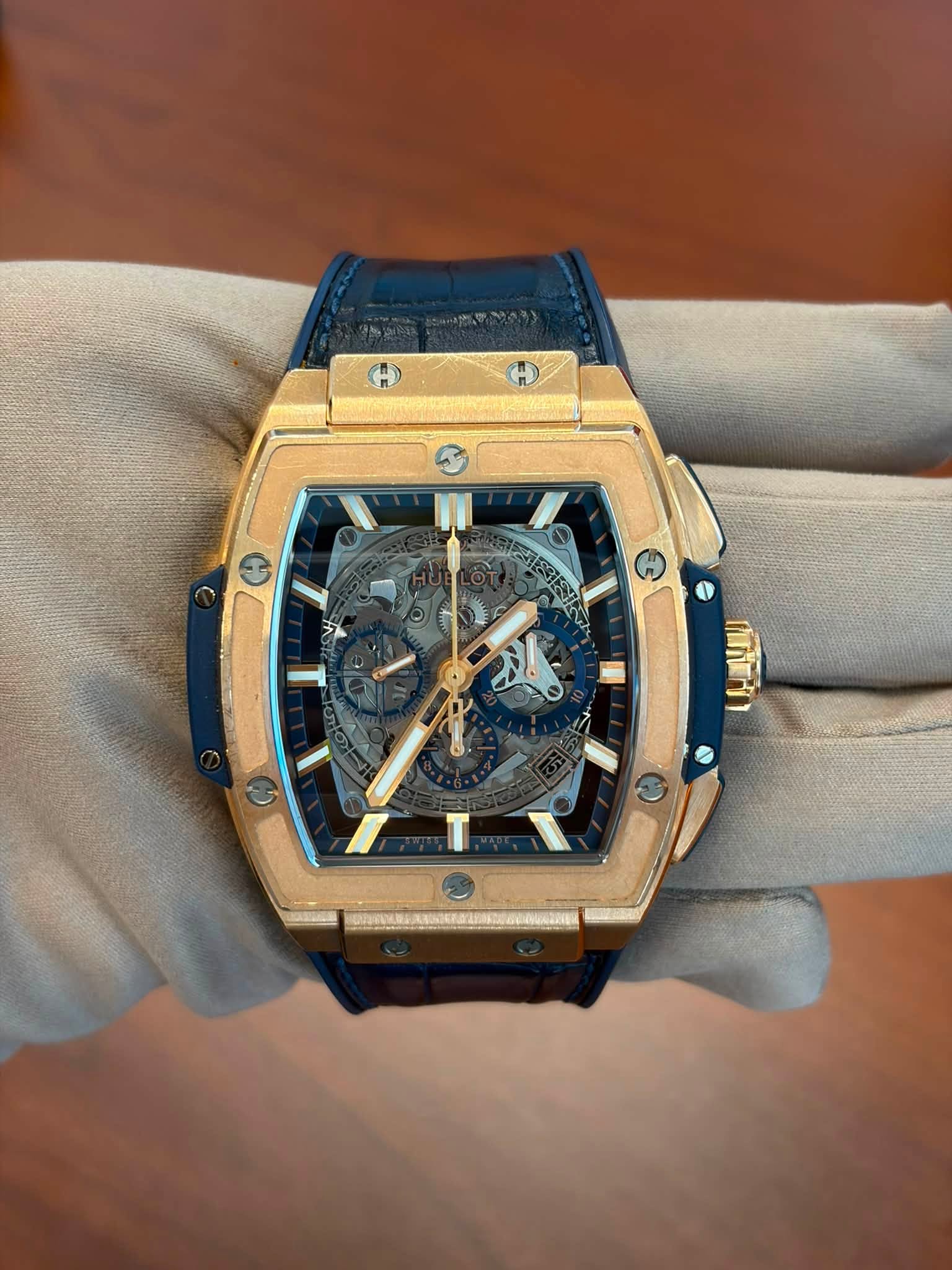 May be an image of wrist watch and text