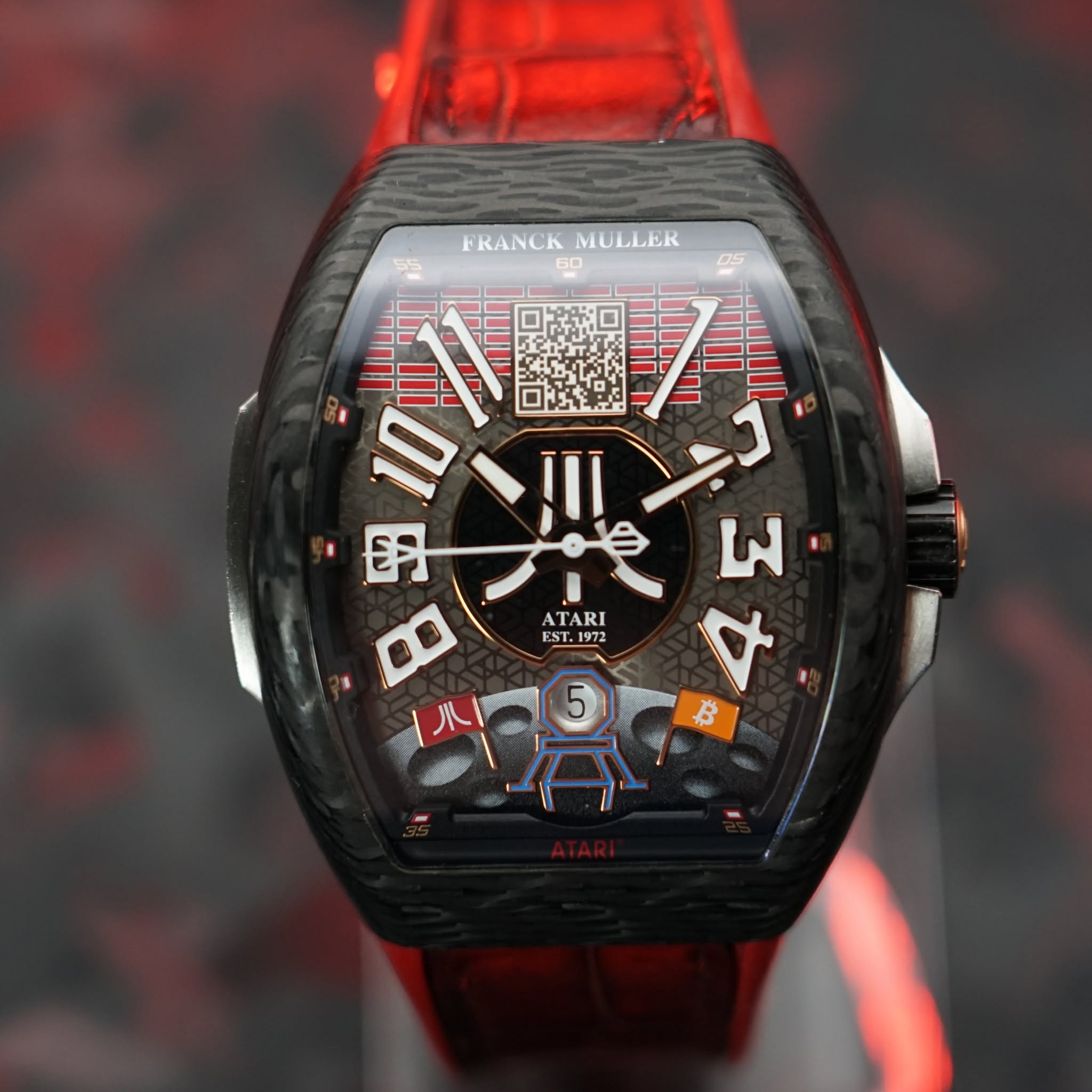 May be an image of digital watch and text that says 'o FRANCKMULLER FRANCK MULLER 10!! 母 ATARI EST FST. FST. W 4 B'