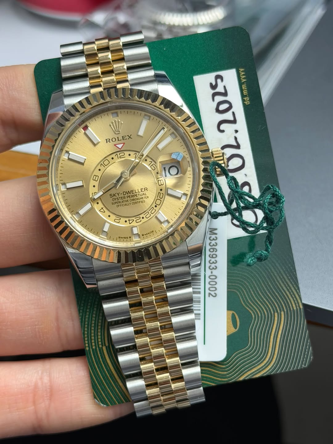 May be an image of wrist watch and text