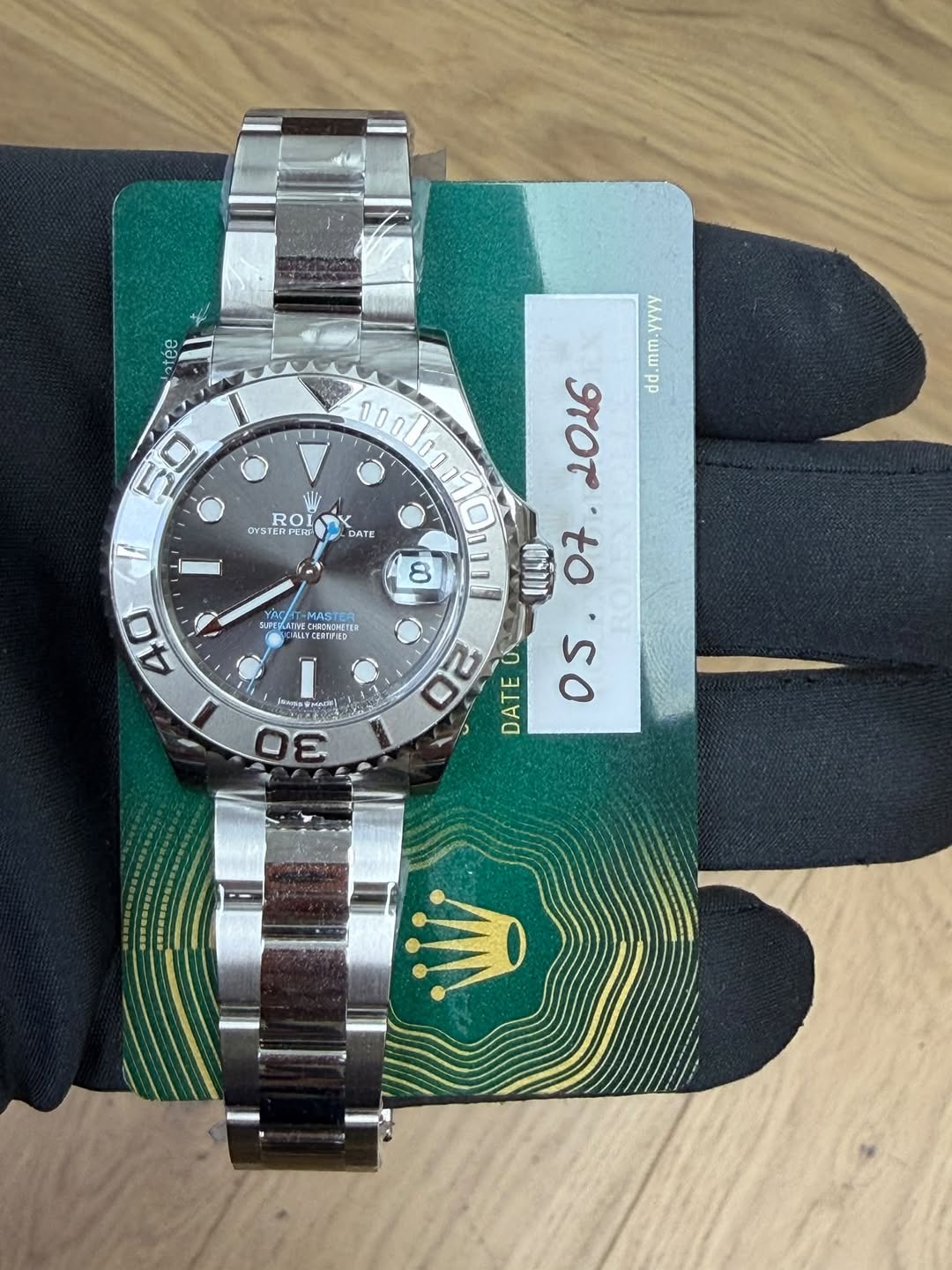 May be an image of wrist watch and text