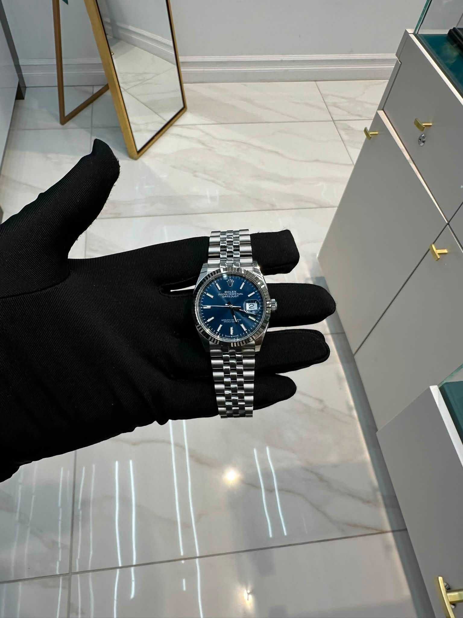 May be an image of wrist watch