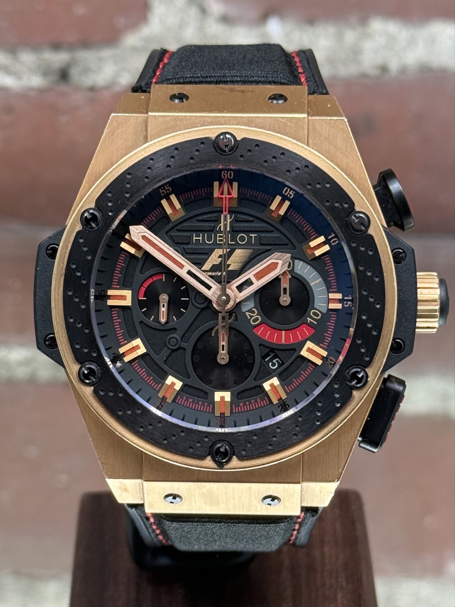 May be an image of wrist watch and text