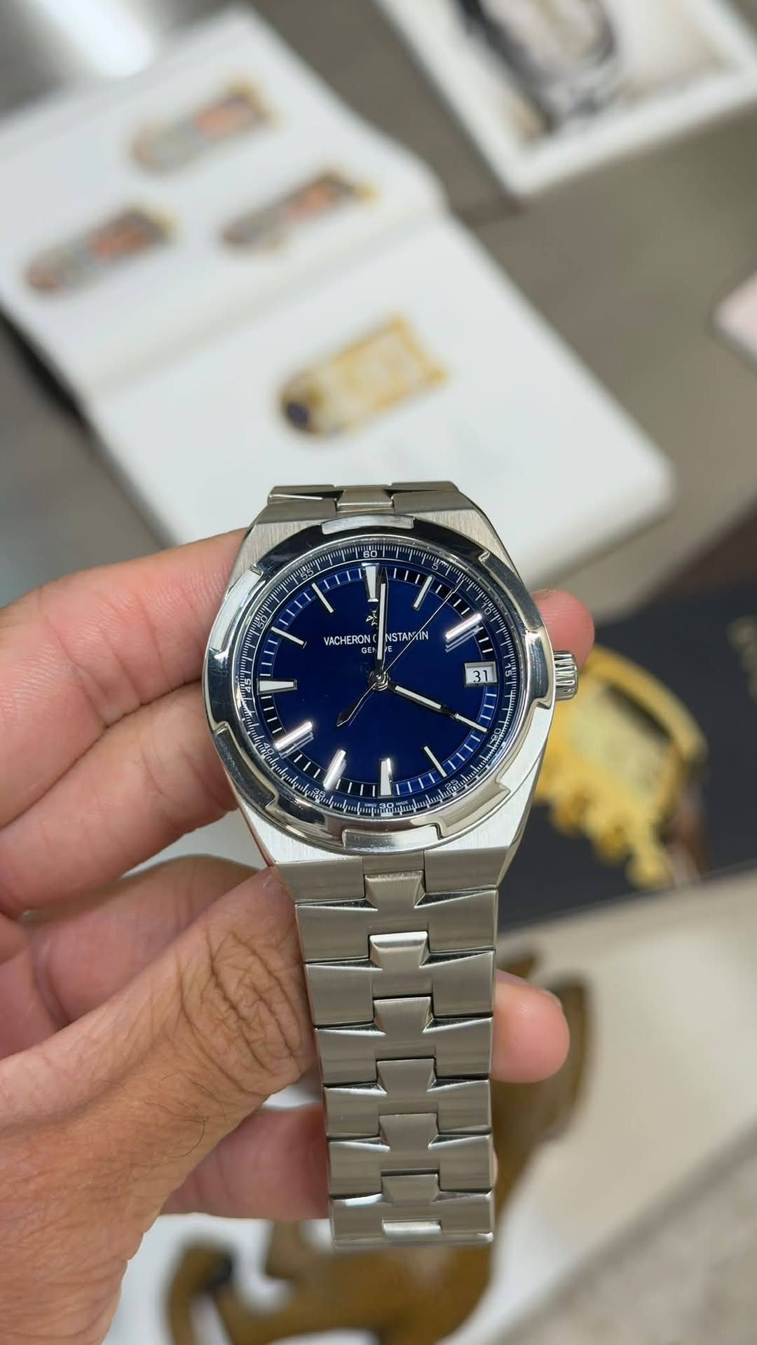May be an image of wrist watch and text