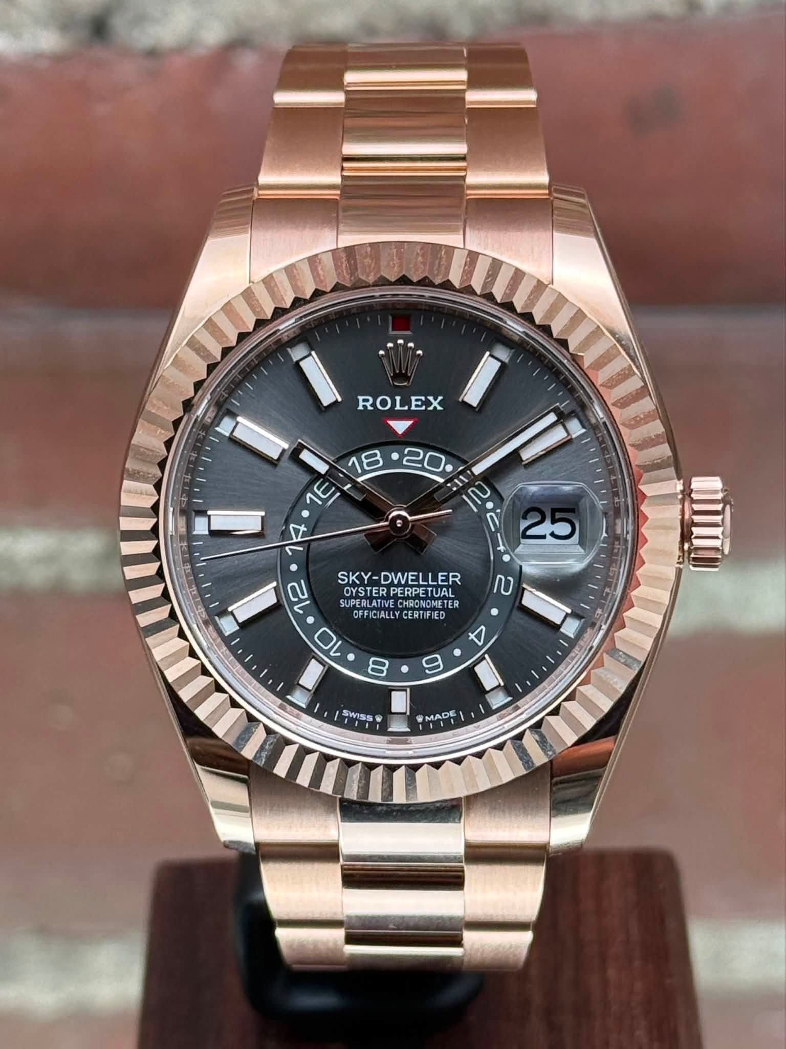 May be an image of wrist watch and text that says 'ROLEX ך E A 0 ဂို 5 በ 12 SKY-DWELLER SKY- OYSTERPERPETUAL OYSTER SUPEBLATS PERPETUAL SUPERLATIV UPE CHRONOMETI OFFICIALLY…