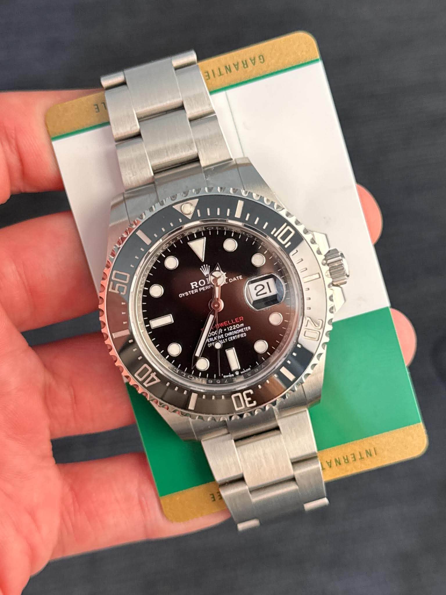 May be an image of wrist watch and text