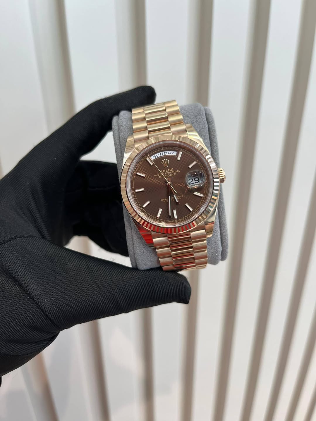 May be an image of wrist watch and text