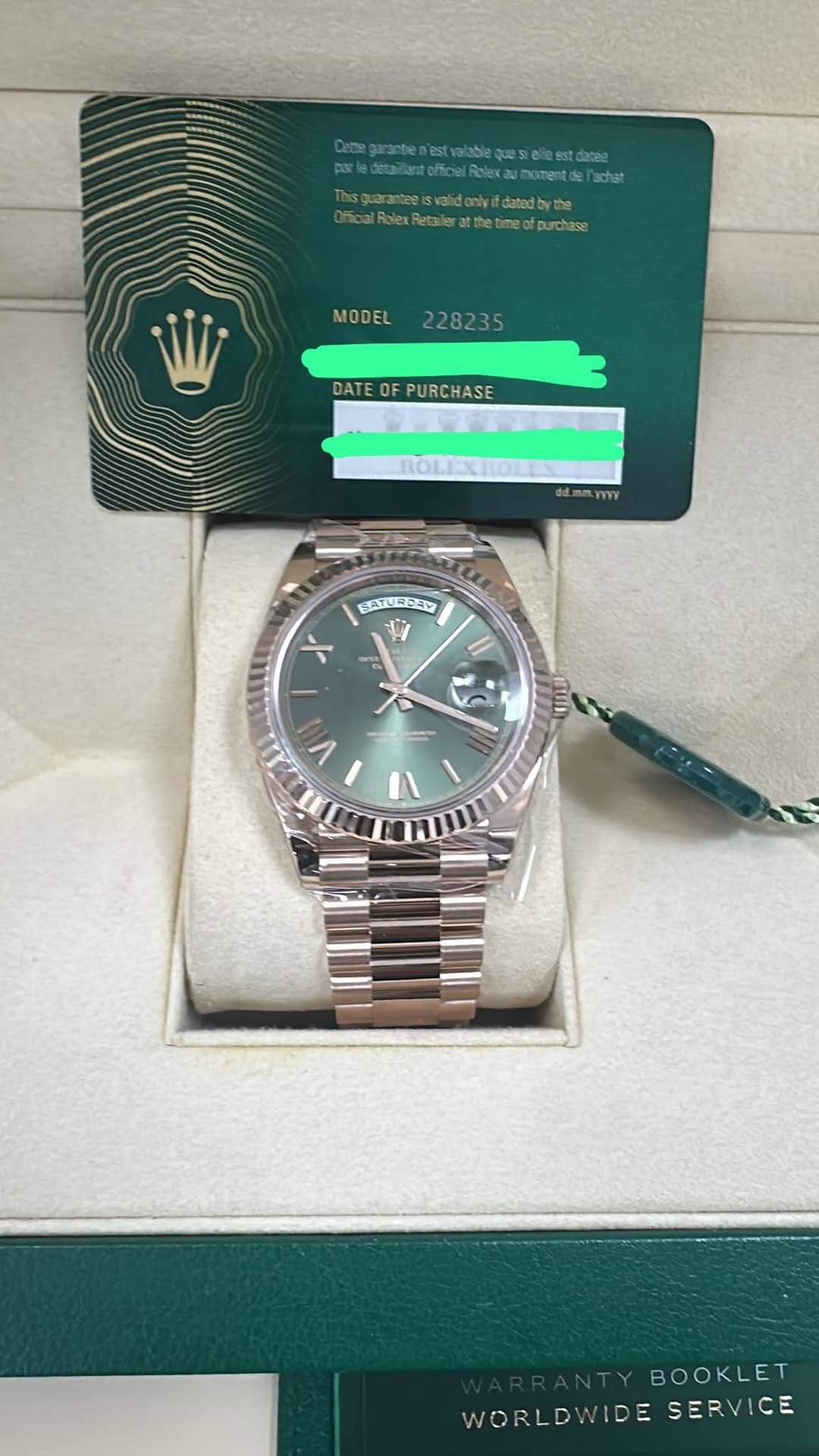 May be an image of wrist watch and text