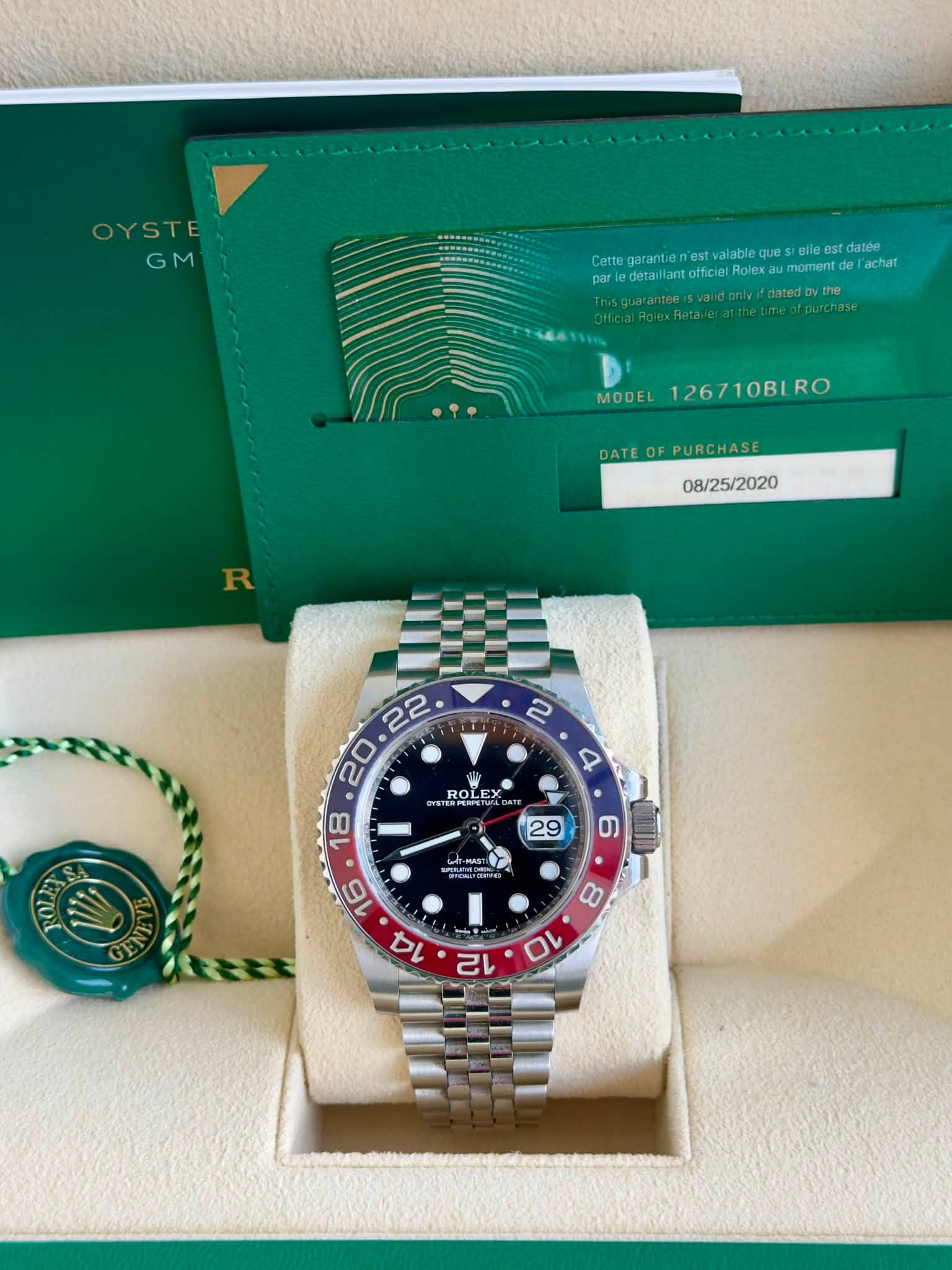 May be an image of wrist watch and text