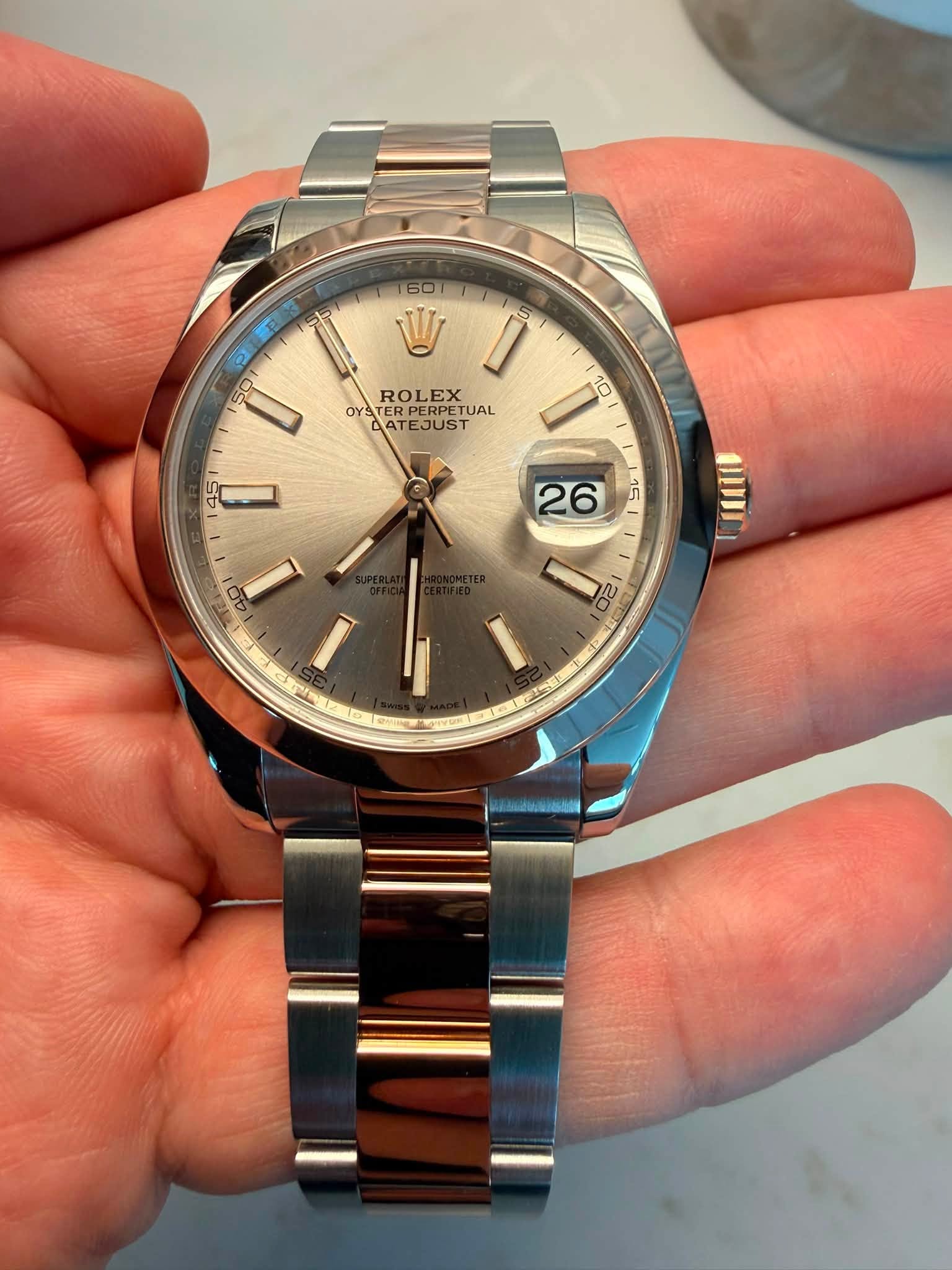 May be an image of wrist watch and text that says '5 2 S0 150 V ROLEX OYS STERP OYRUSTUA ROLEXTUAL PERPETUAL TUAL CATE TEJUST ก beuUNIGNIS'
