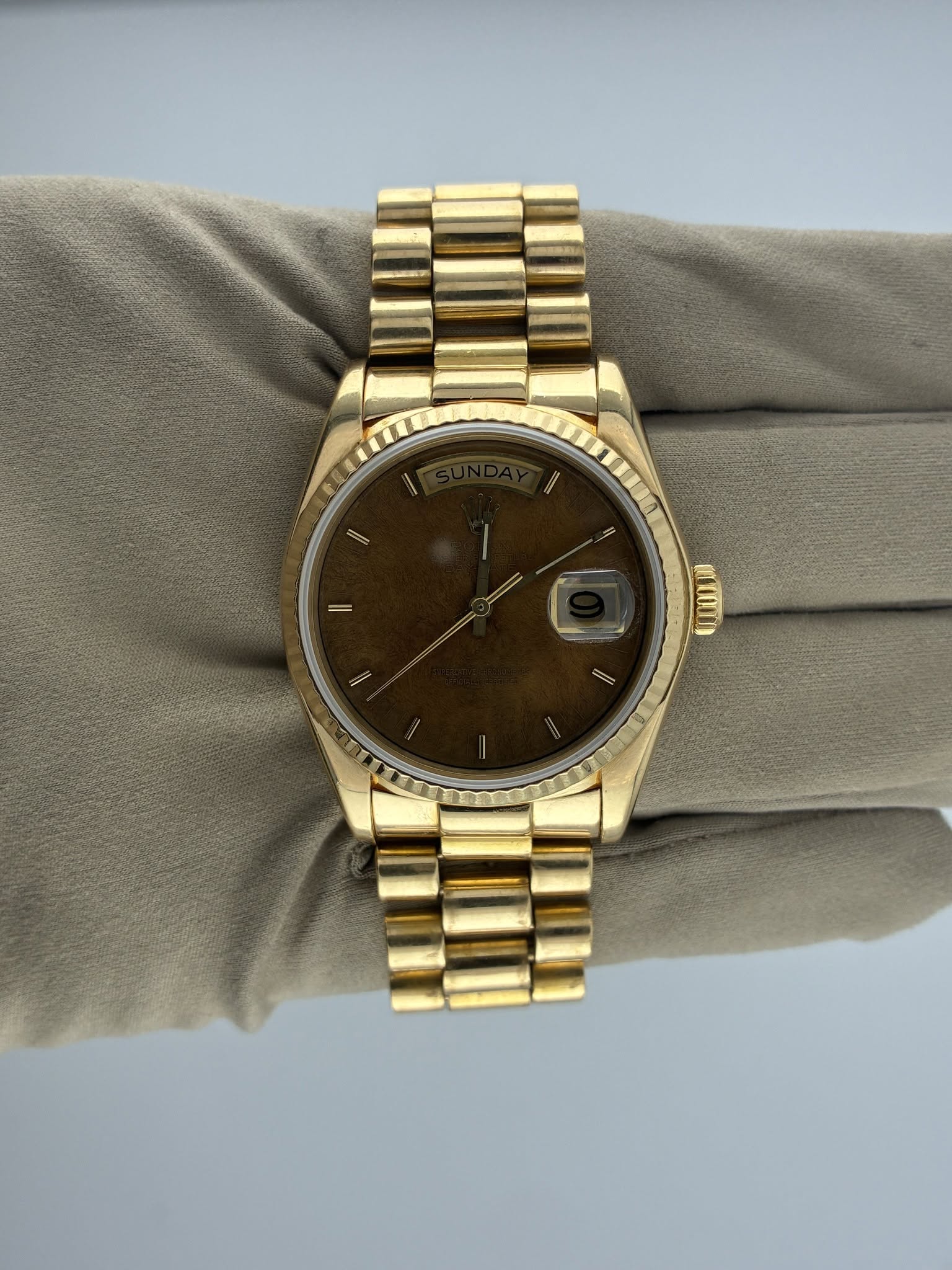 May be an image of wrist watch and text