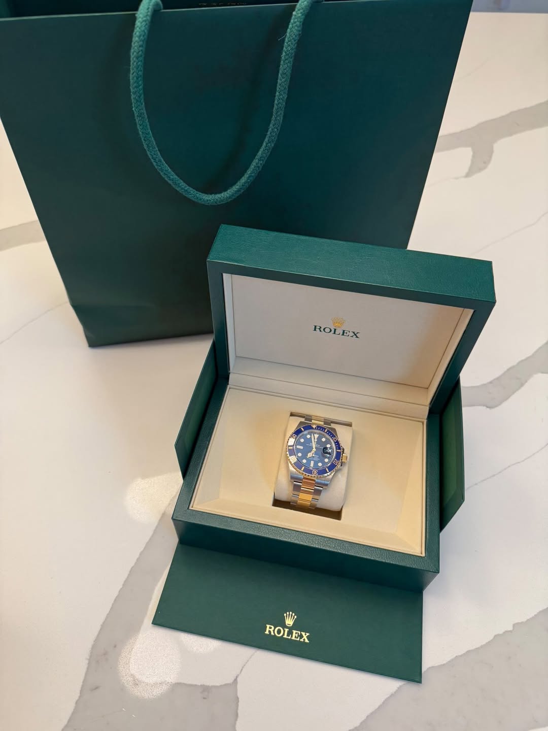 May be an image of wrist watch and text that says 'ROLEX ROLEX EX RO - 2 IF صريا S - P ROLEX ROLEX'