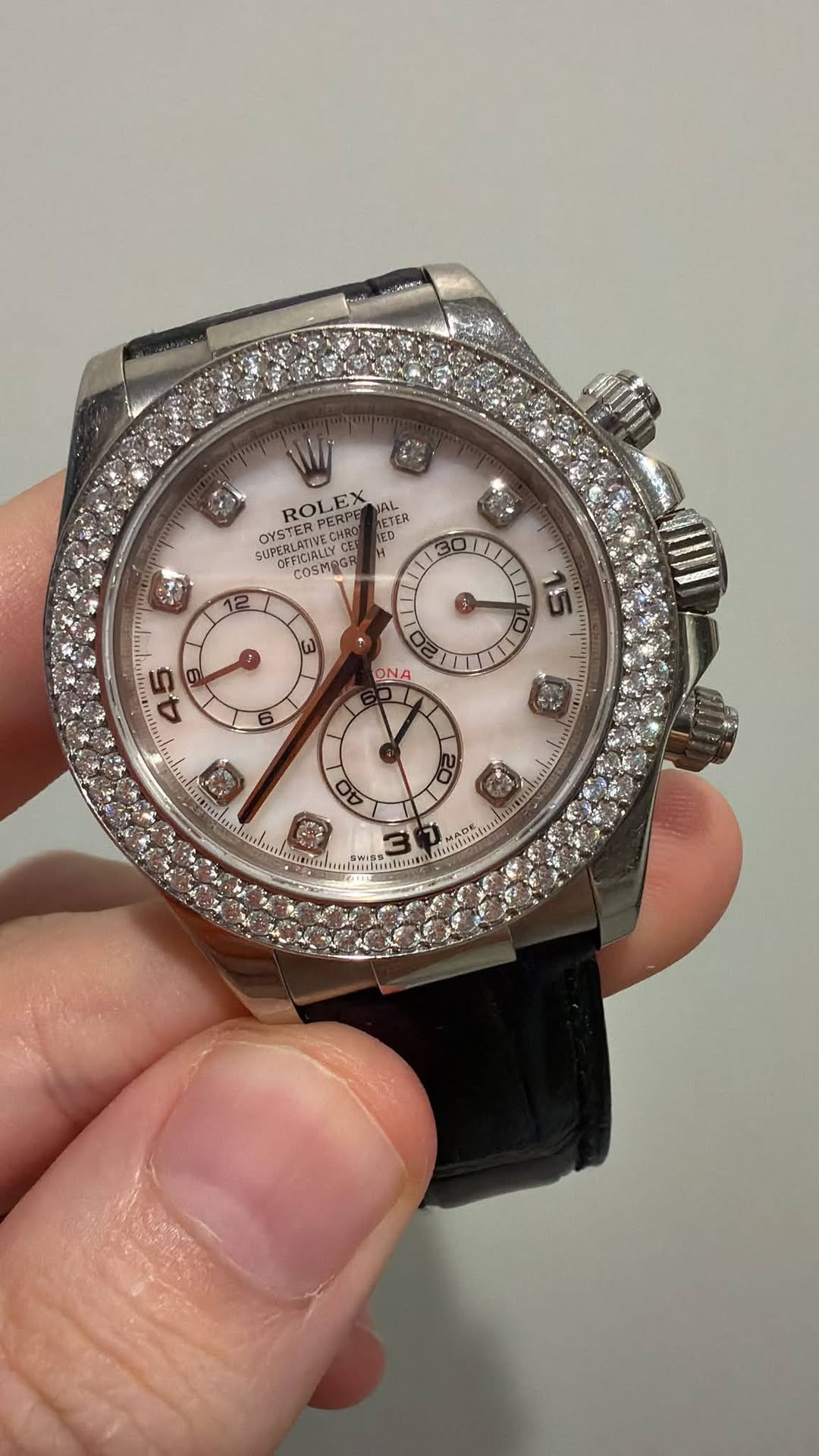 May be an image of wrist watch