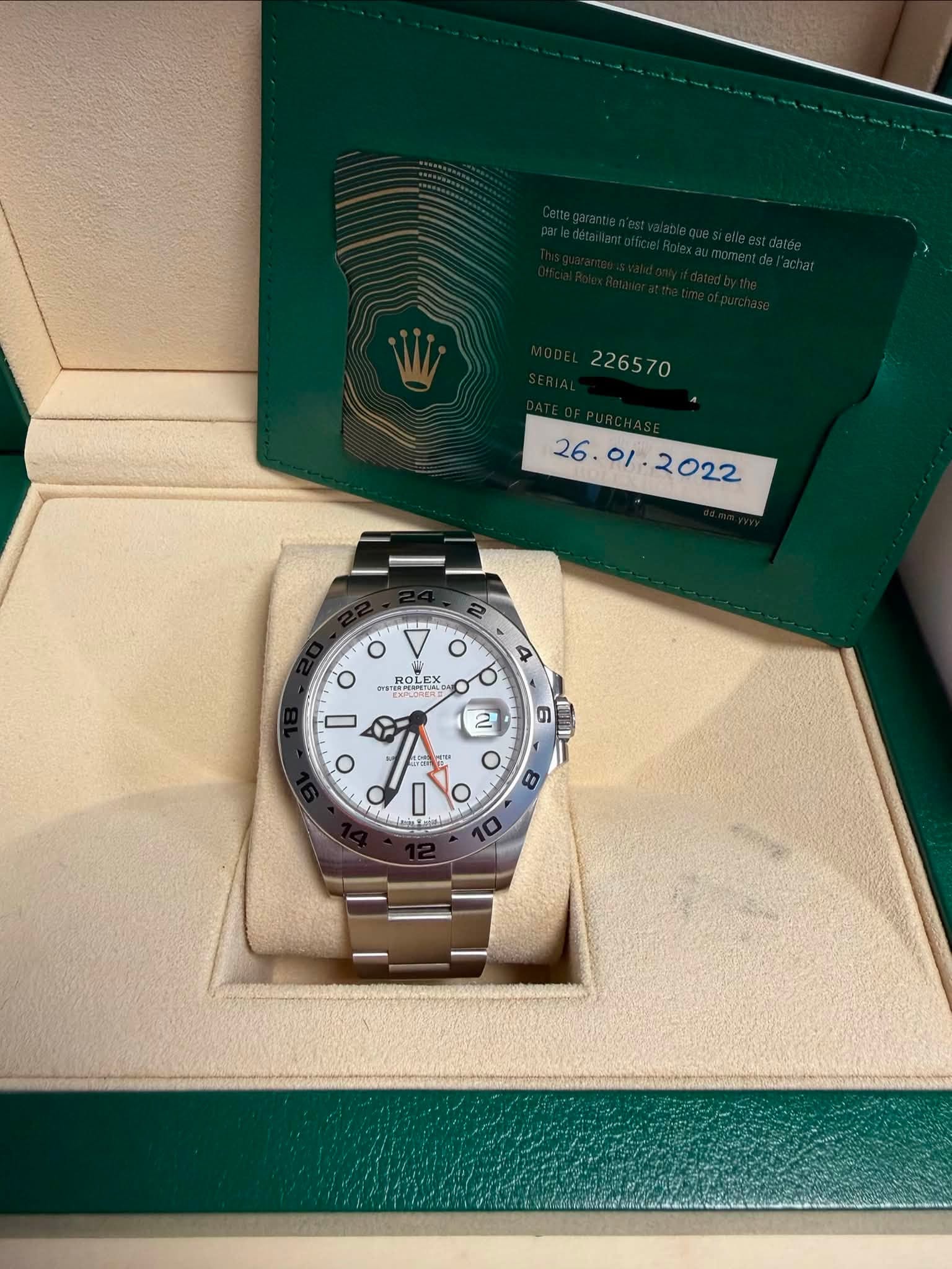 May be an image of wrist watch and text that says ' O 2 4 ROLEX 브at ROLE EPGET EPLORE O D O 6 6 2 O 円 O 8 D'