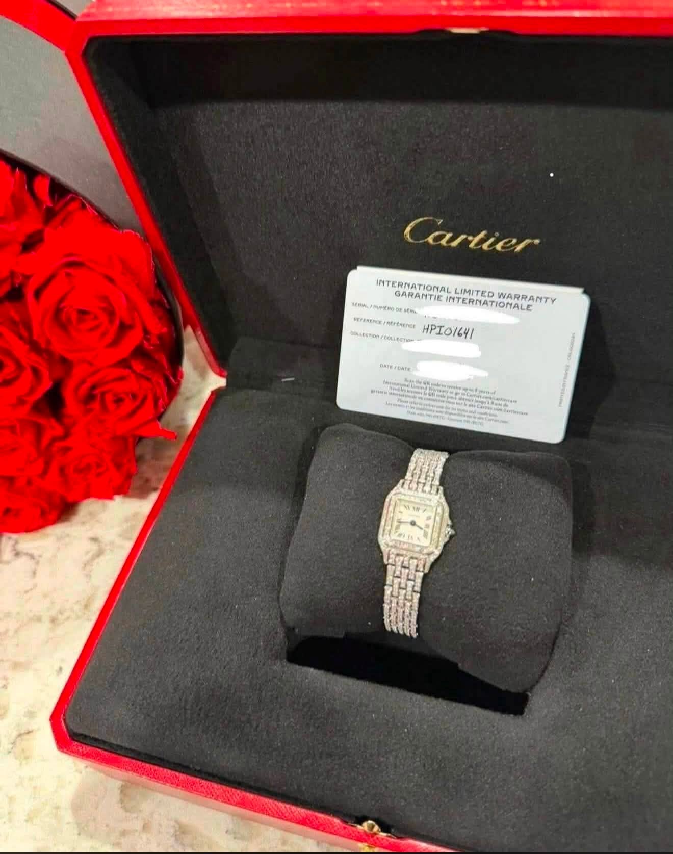 May be an image of wrist watch, ring and text