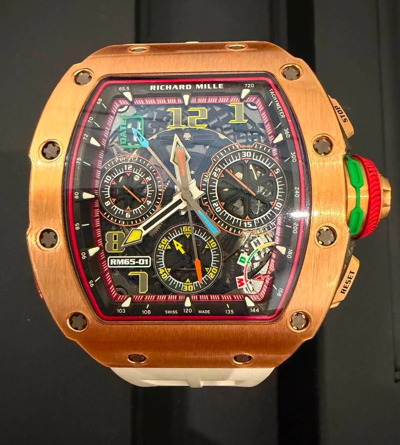 May be an image of wrist watch and text