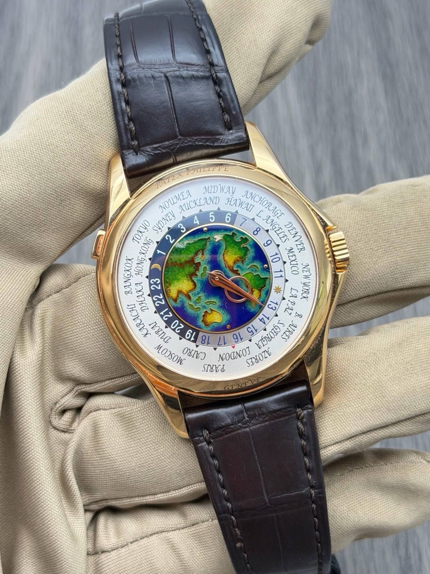 May be an image of map, wrist watch and text