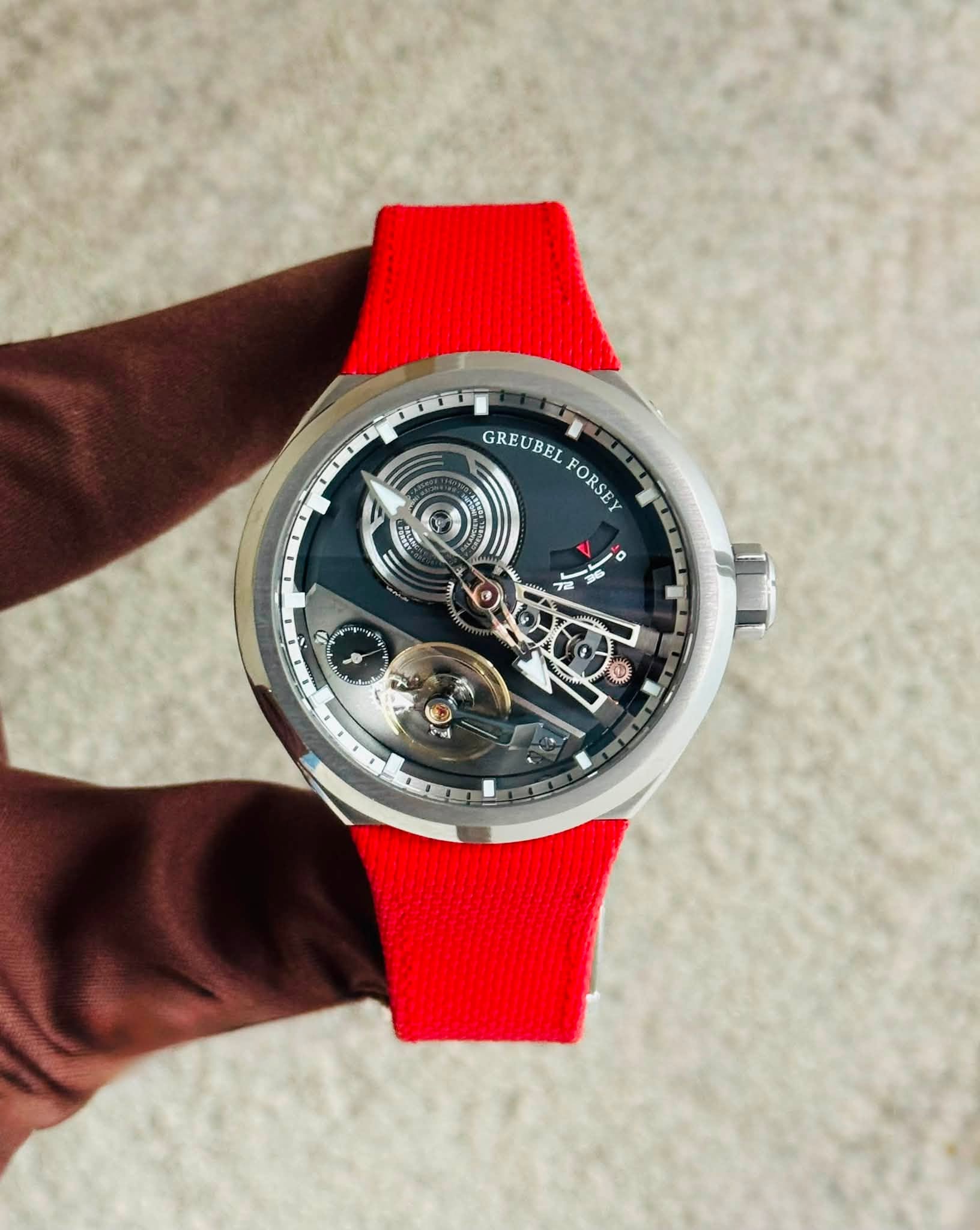May be an image of wrist watch and text that says 'GREUBEL BEL FORSEY つー T いけ o e'