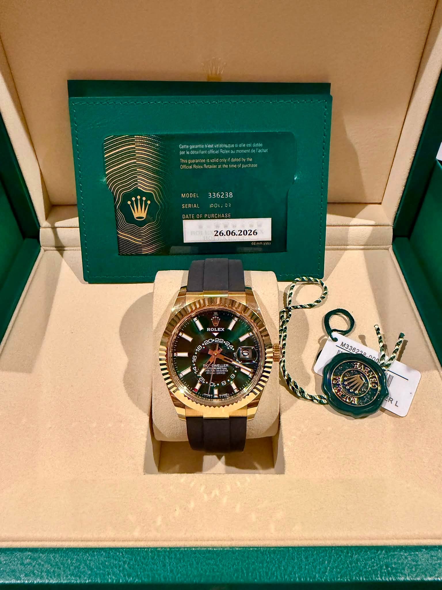 May be an image of wrist watch and text