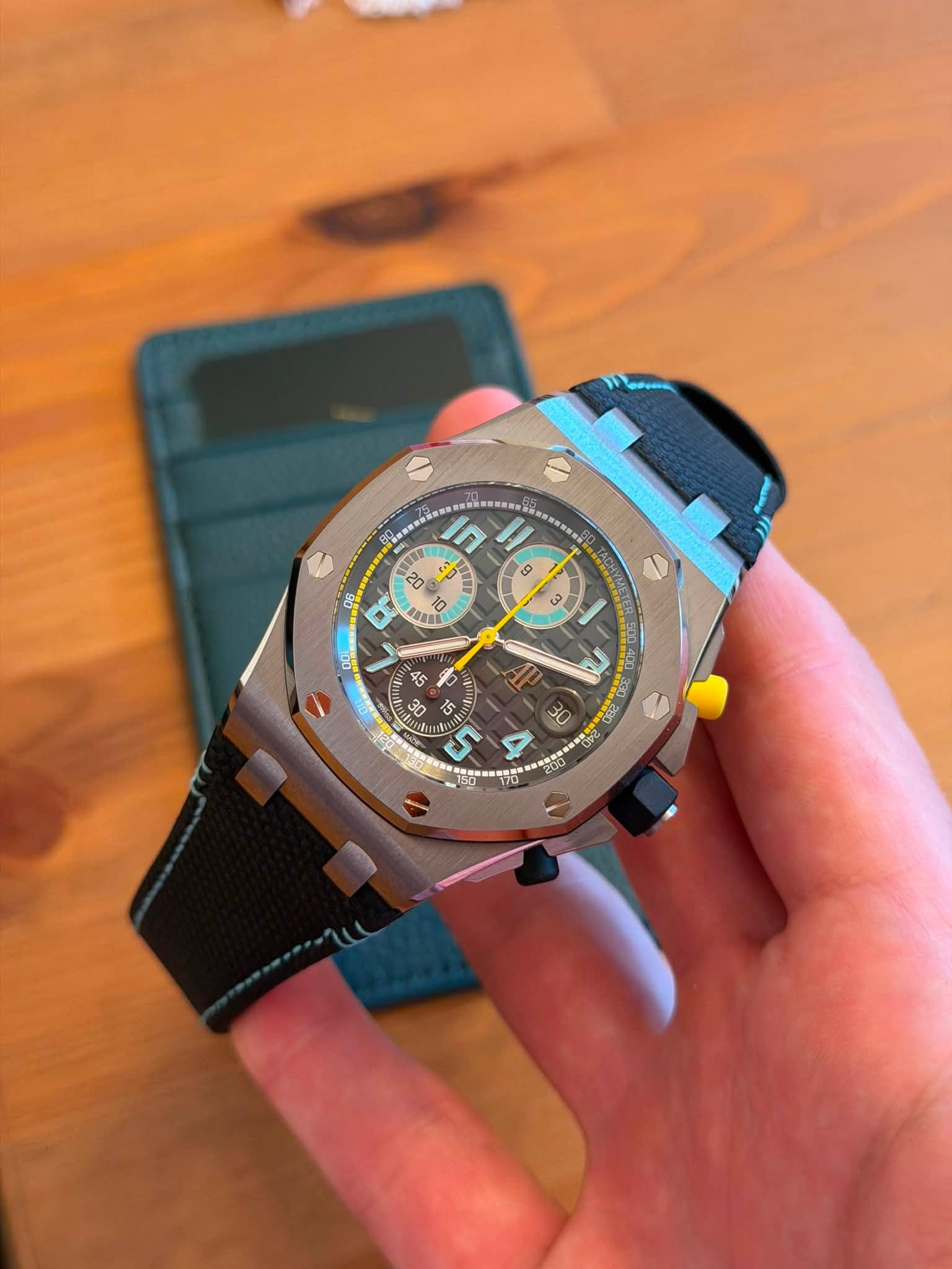 May be an image of wrist watch and text