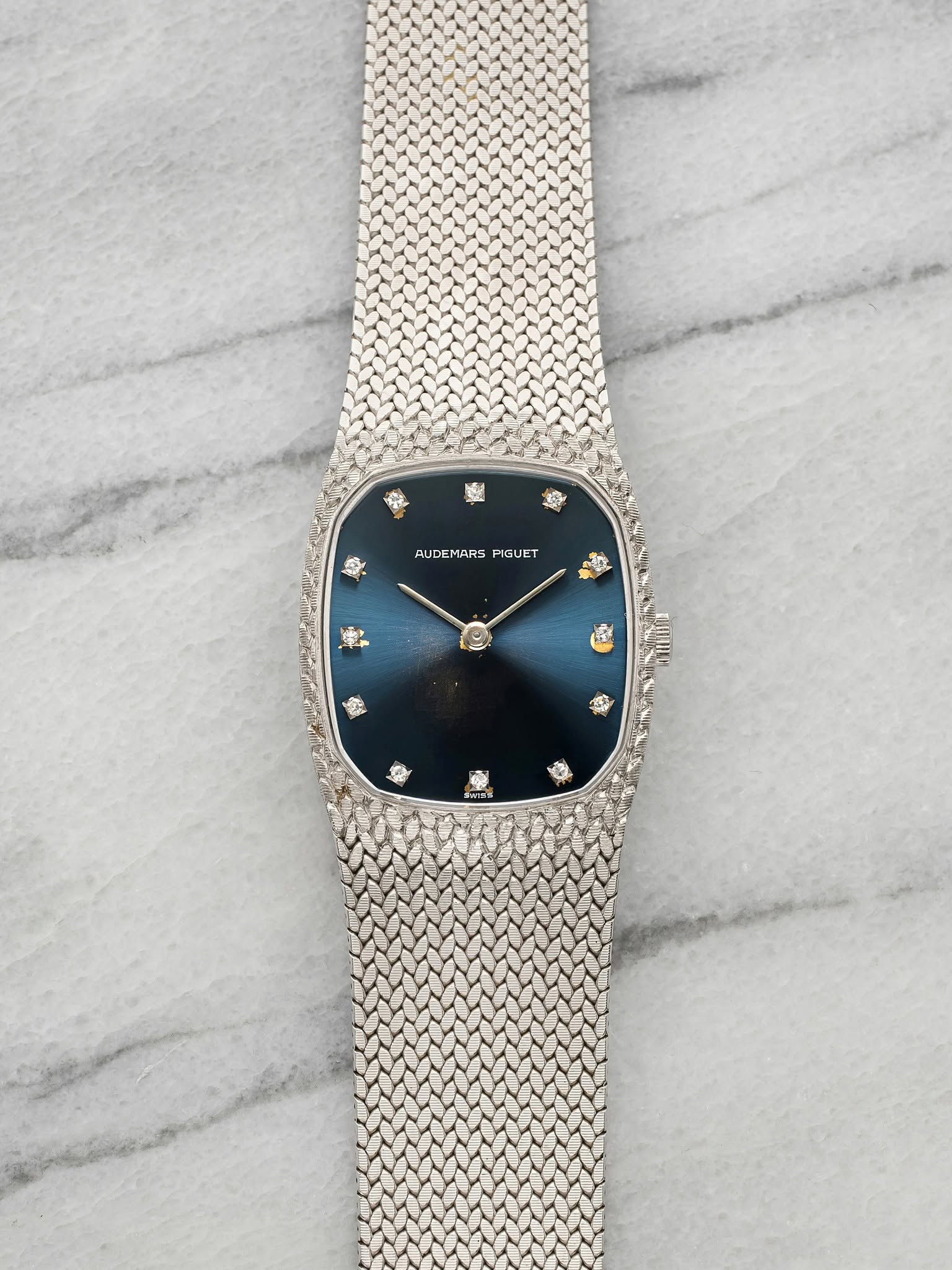 May be an image of wrist watch