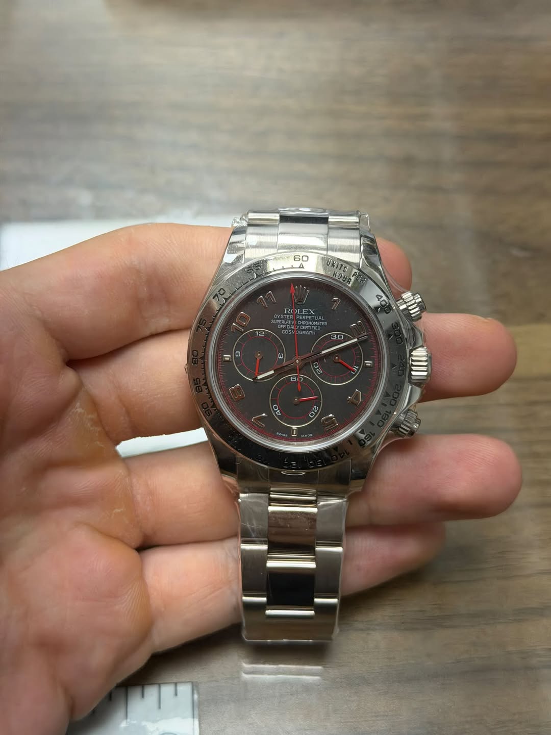 May be an image of wrist watch and text that says '60 税すで ETS ROLE 30 2 02'