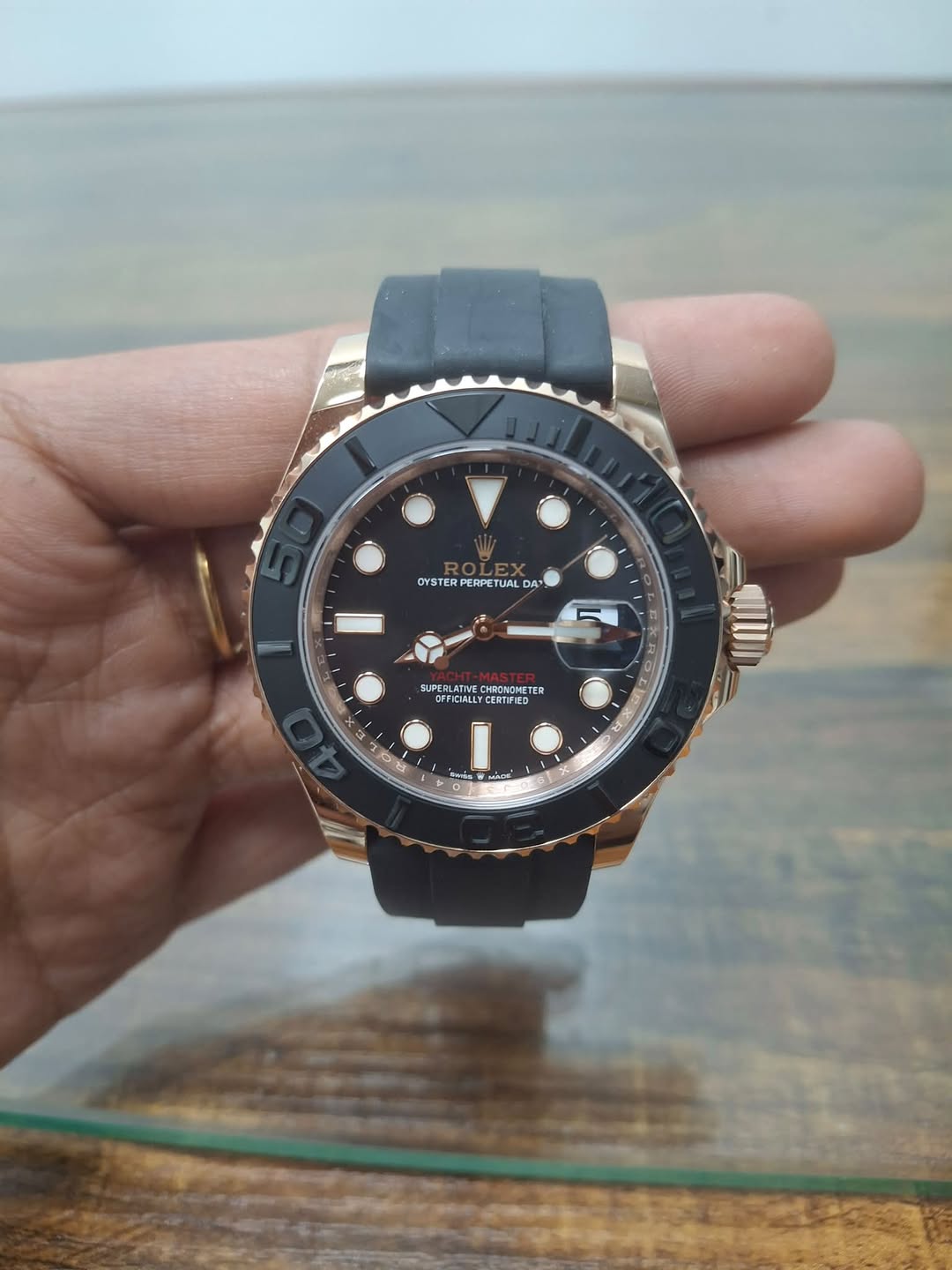 May be an image of wrist watch and text