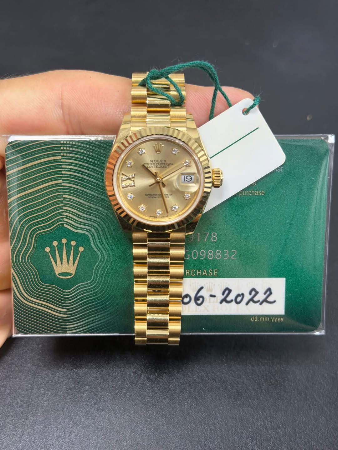 May be an image of wrist watch and text