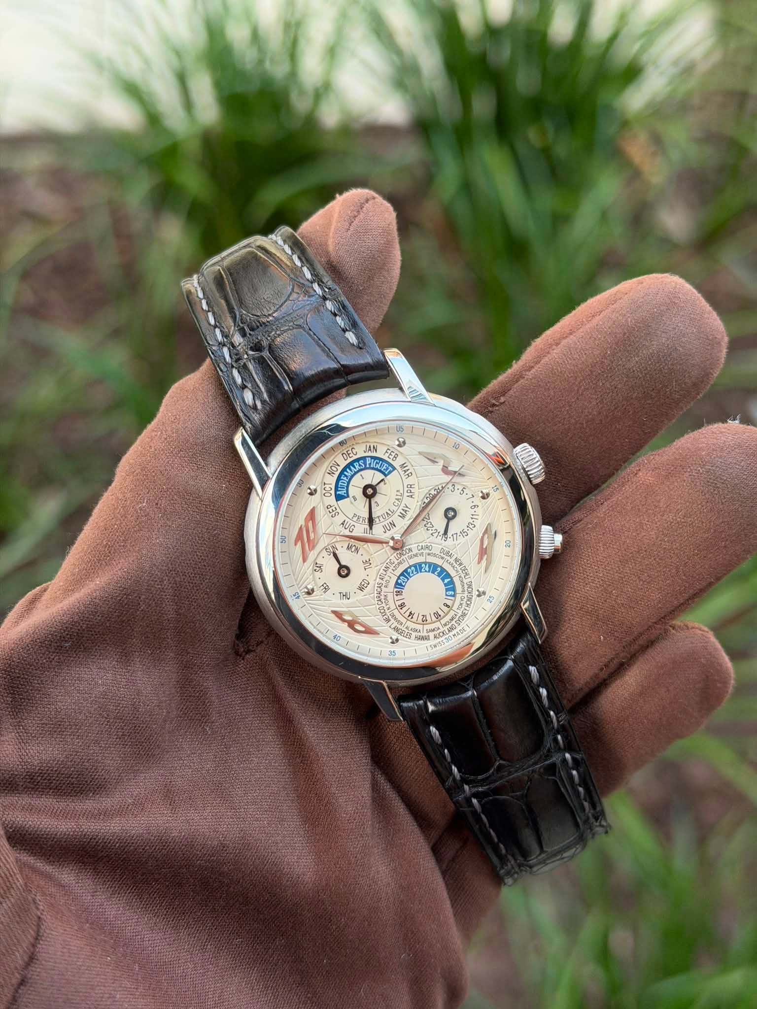 May be an image of wrist watch and text