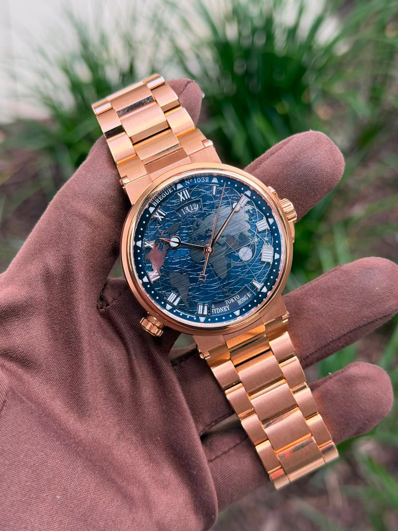 May be an image of wrist watch and text that says 'N 1032 BREGUE XII XI 1312 X IX II (EBO) |॥ IA SYDNEY TOAYO TOATUONO BONG'