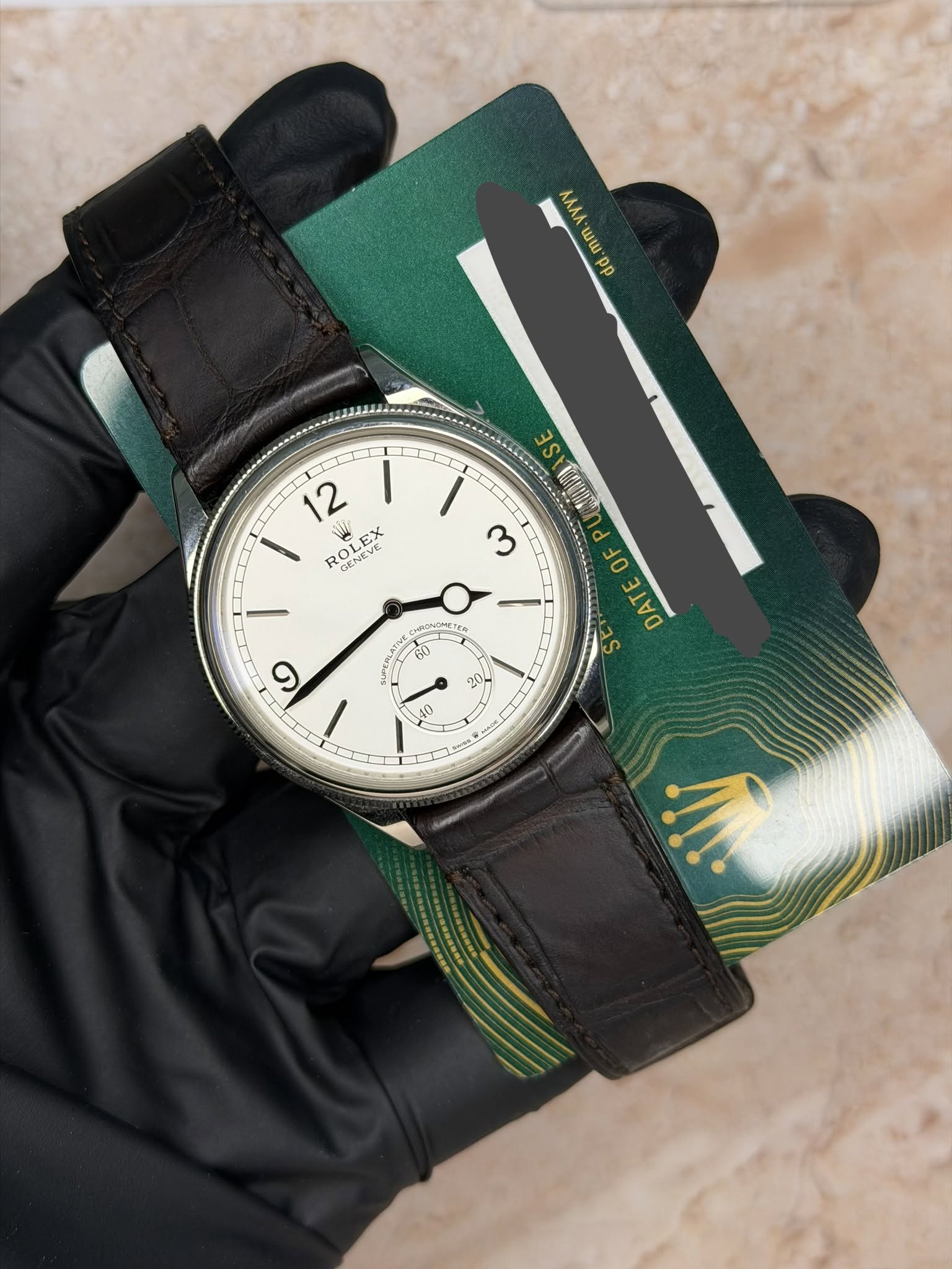 May be an image of wrist watch and text