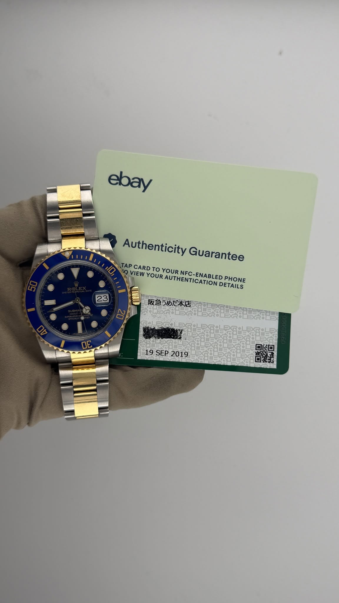 May be an image of wrist watch and text that says 'ebay Authenticity AuthenticityGuarantee Guarantee TAP CARD IEW YOUR VIEWYOUNOURNIFC-ENABLEDPHON OURAUTHENTICATIONDETAILS…